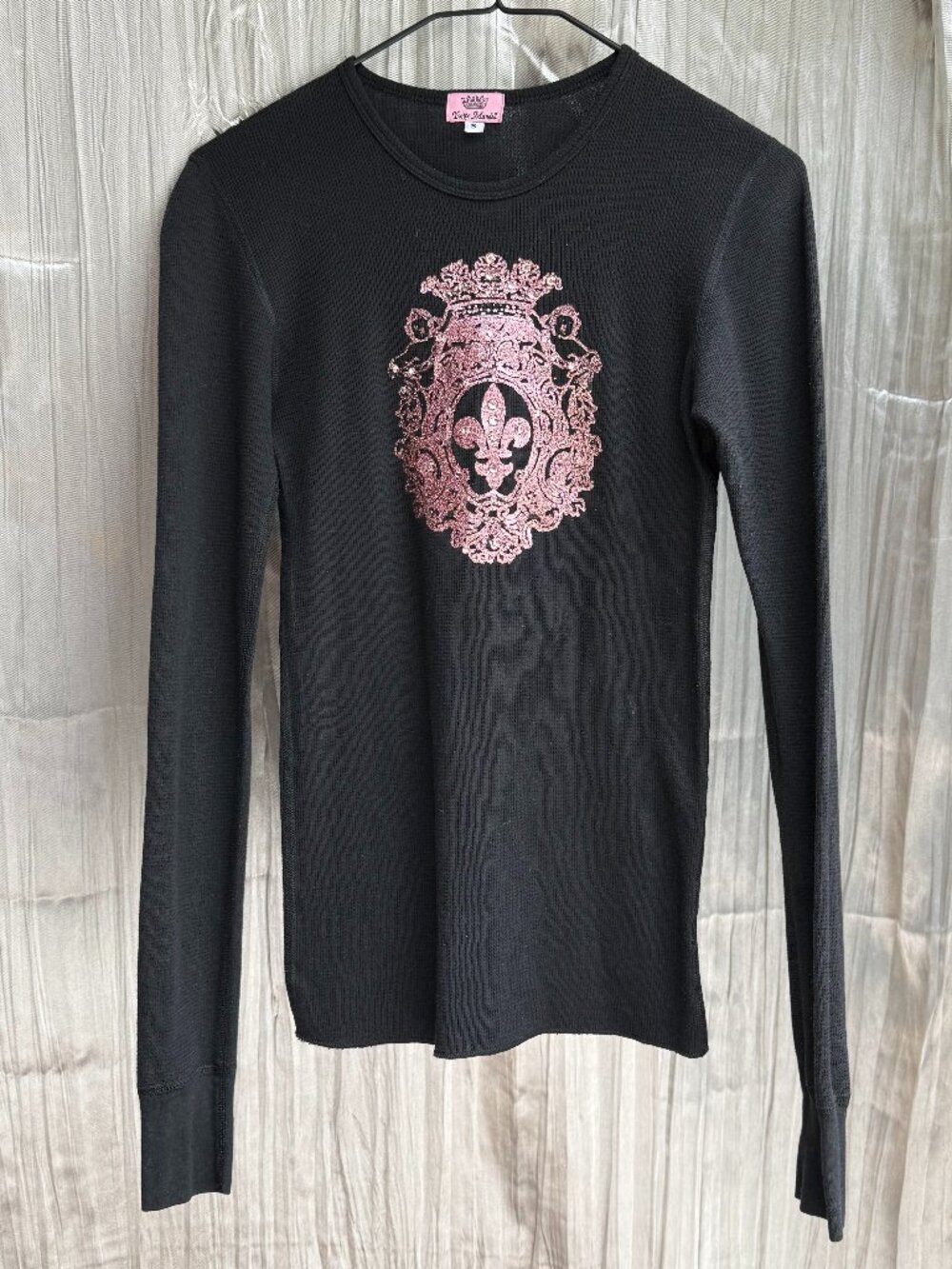 Yvette Mandell size small black long-sleeve with pink fleur de lis embellishment